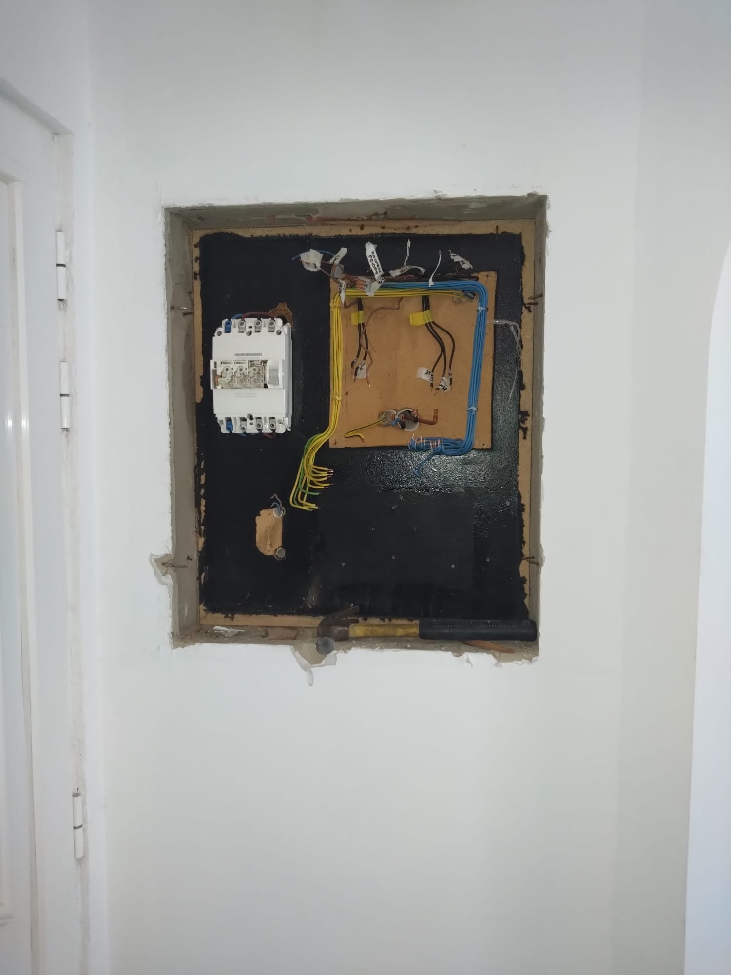 Existing electrical consumer unit before replacement