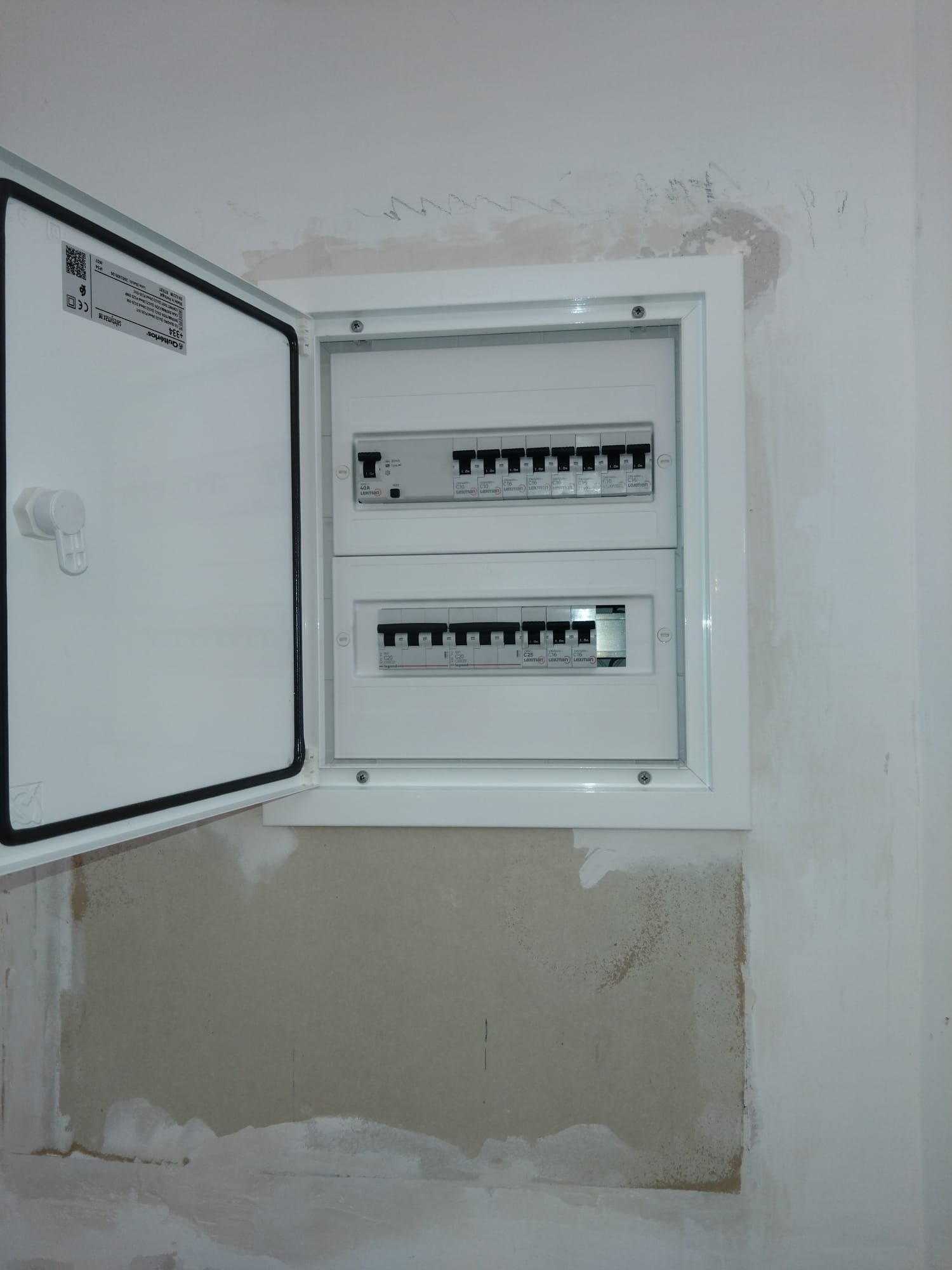 Surface-mounted electrical conduit installed in a timber room