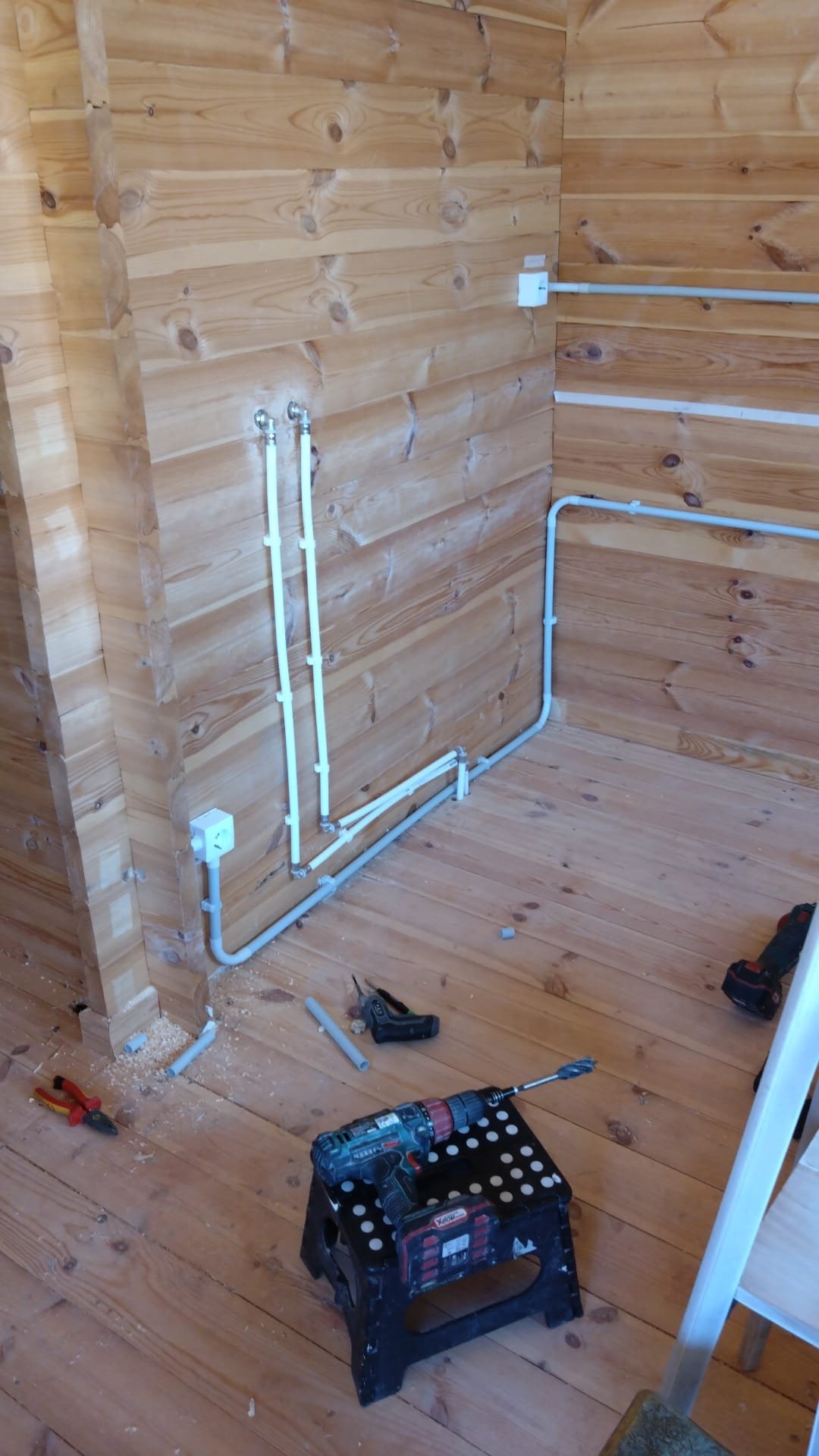 Consumer unit installed with conduit in a timber building